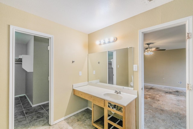 bathroom with vanity and ceiling fan