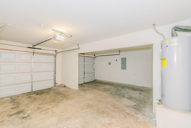 garage featuring water heater, a garage door opener, and electric panel