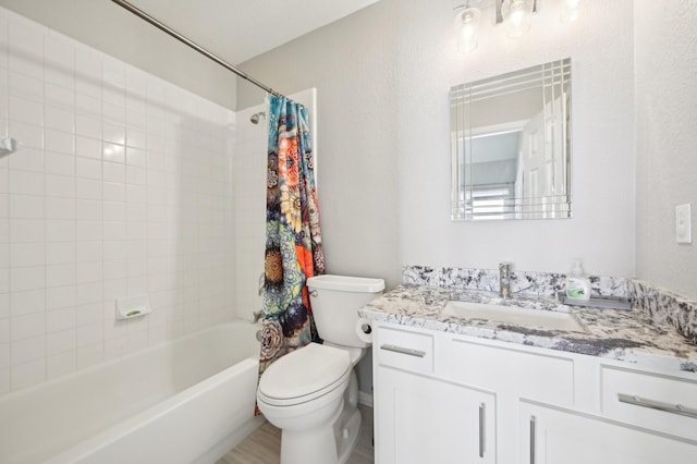 full bathroom with vanity, toilet, and shower / bath combo with shower curtain