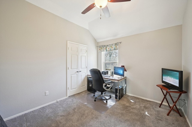 office area featuring lofted ceiling, carpet, and ceiling fan