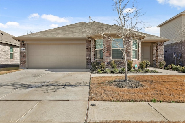 single story home featuring a garage