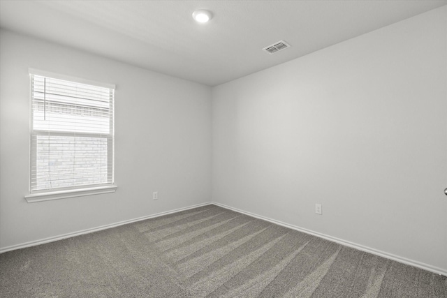 unfurnished room featuring carpet floors