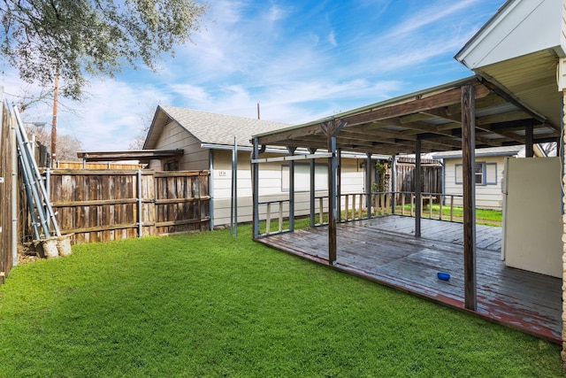 view of yard featuring a wooden deck