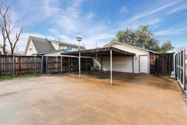 garage featuring a carport