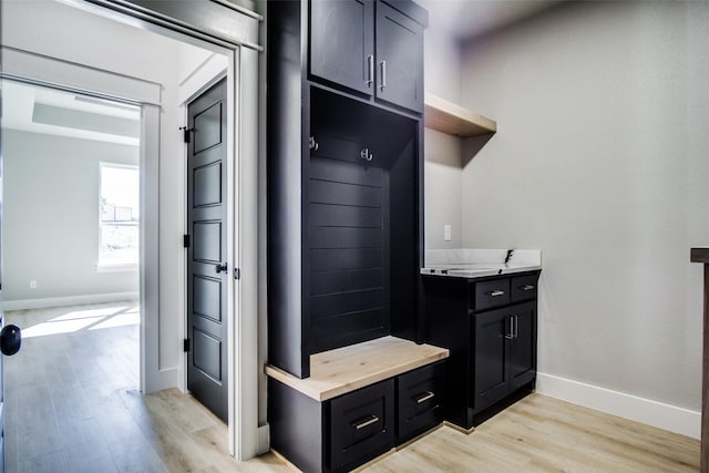 mudroom with light wood-type flooring