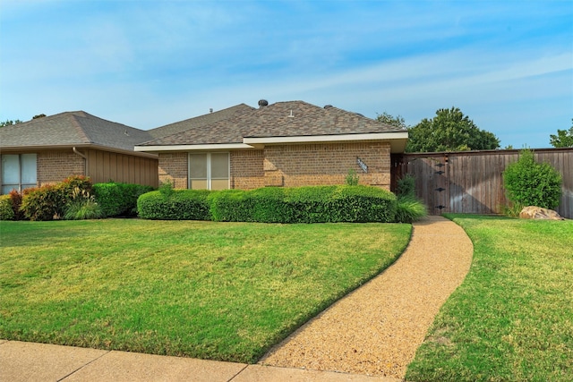 view of home's exterior with a yard