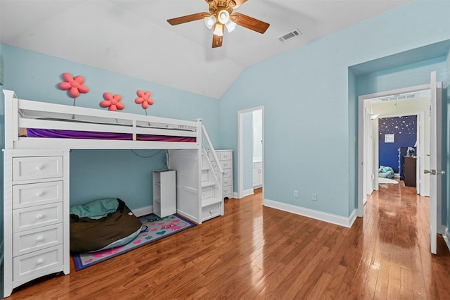 bedroom featuring lofted ceiling, ceiling fan, and hardwood / wood-style floors