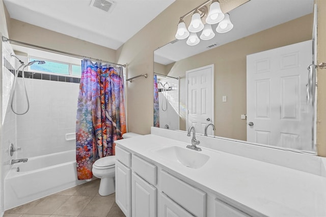 full bathroom featuring tile patterned floors, toilet, shower / tub combo with curtain, and vanity