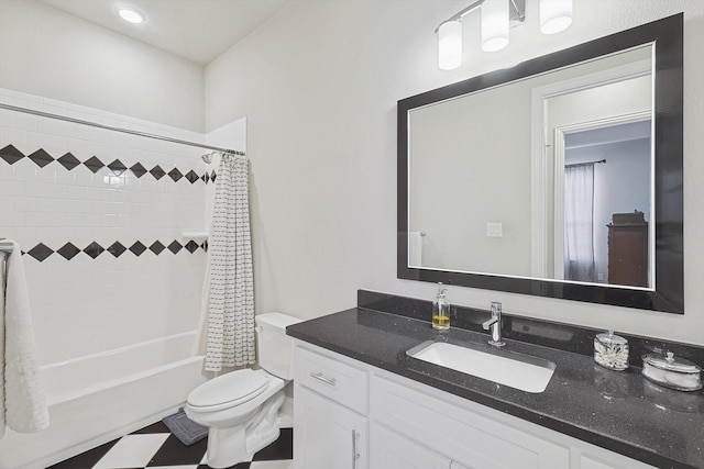 full bathroom featuring shower / tub combo with curtain, vanity, and toilet