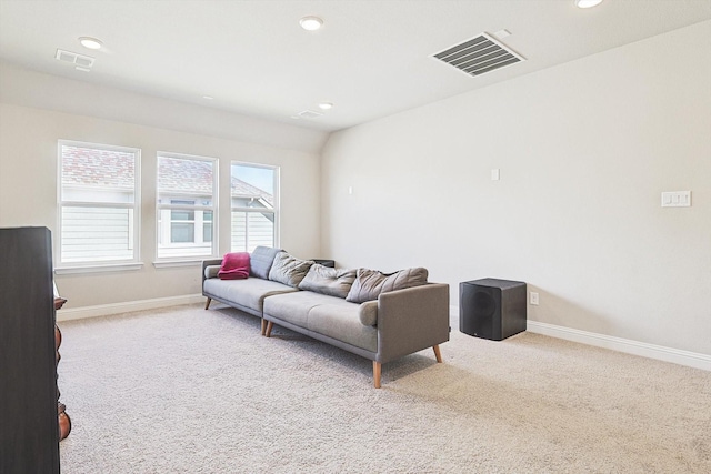 living room featuring light carpet