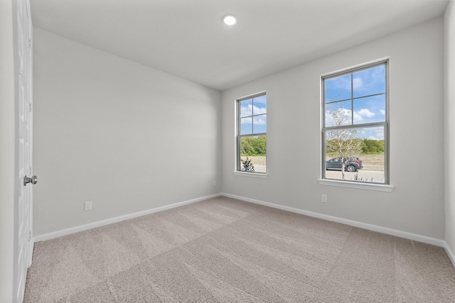 view of carpeted spare room