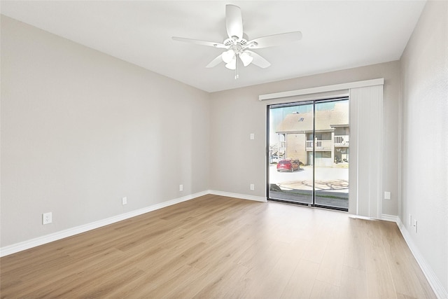 unfurnished room featuring light hardwood / wood-style floors and ceiling fan