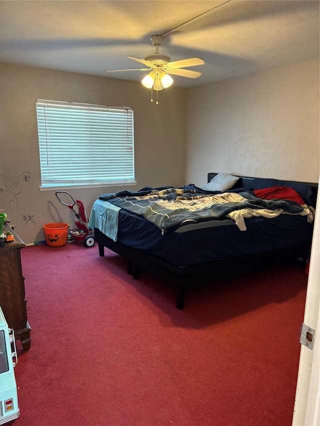 bedroom featuring carpet and ceiling fan