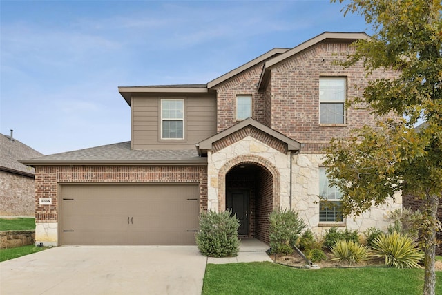 view of front of home with a garage