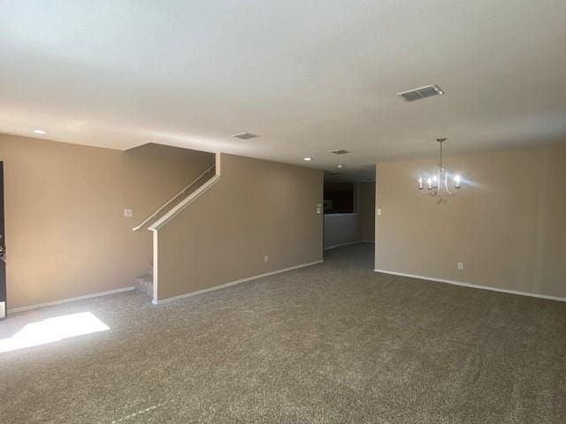 14029 Coyote Trl, Fort Worth, TX 76052 - unfurnished living room with a notable chandelier, carpet floors, visible vents, baseboards, and stairs