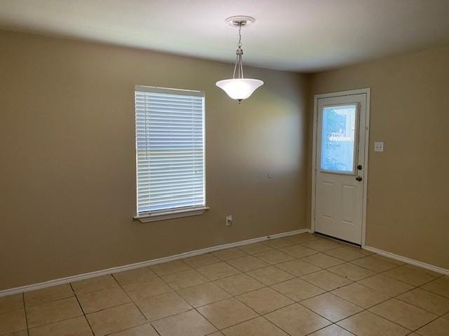 14029 Coyote Trl, Fort Worth, TX 76052 - unfurnished room with baseboards and light tile patterned floors