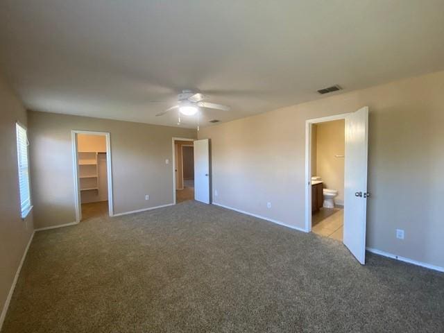 14029 Coyote Trl, Fort Worth, TX 76052 - unfurnished bedroom featuring carpet flooring, visible vents, baseboards, and a spacious closet