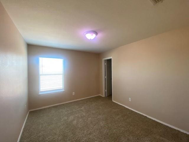 14029 Coyote Trl, Fort Worth, TX 76052 - spare room featuring carpet and baseboards