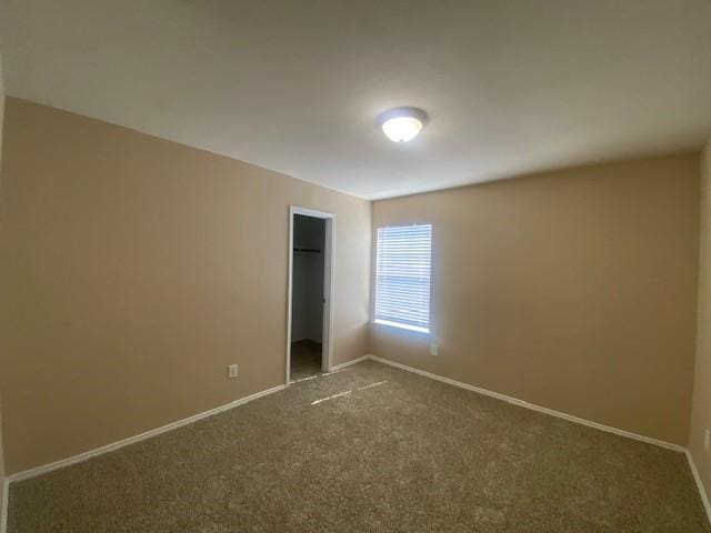 14029 Coyote Trl, Fort Worth, TX 76052 - unfurnished bedroom with carpet flooring, a closet, and baseboards