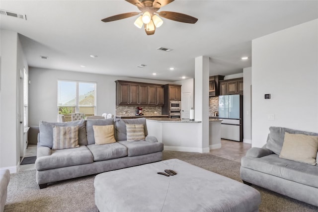 living room featuring ceiling fan