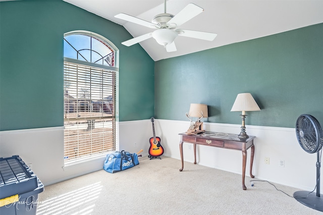 miscellaneous room with ceiling fan, carpet floors, and vaulted ceiling