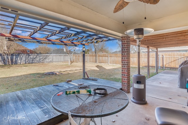 view of patio / terrace featuring ceiling fan and a pergola