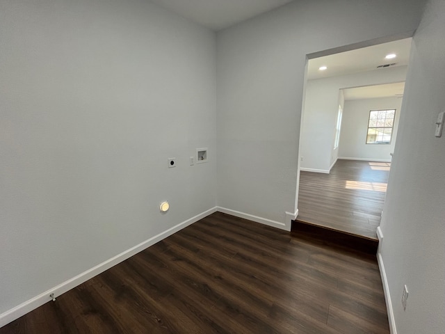 empty room featuring dark wood-type flooring