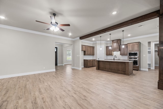 2021 Crystal Palace Blvd, Alvarado, TX 76009 - kitchen featuring a ceiling fan, light countertops, open floor plan, and appliances with stainless steel finishes