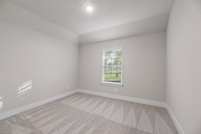 2021 Crystal Palace Blvd, Alvarado, TX 76009 - unfurnished room with baseboards, light carpet, and lofted ceiling