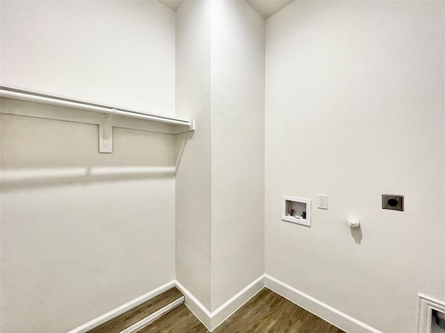 1511 W 13th Ave, Corsicana, TX 75110 - laundry room with hookup for a gas dryer, dark wood finished floors, electric dryer hookup, and washer hookup