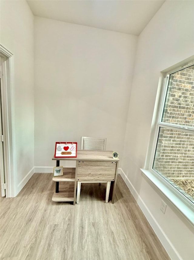 living area featuring hardwood / wood-style floors