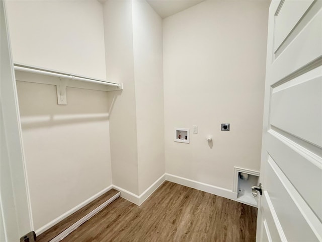 laundry room featuring gas dryer hookup, hookup for a washing machine, hookup for an electric dryer, and hardwood / wood-style flooring