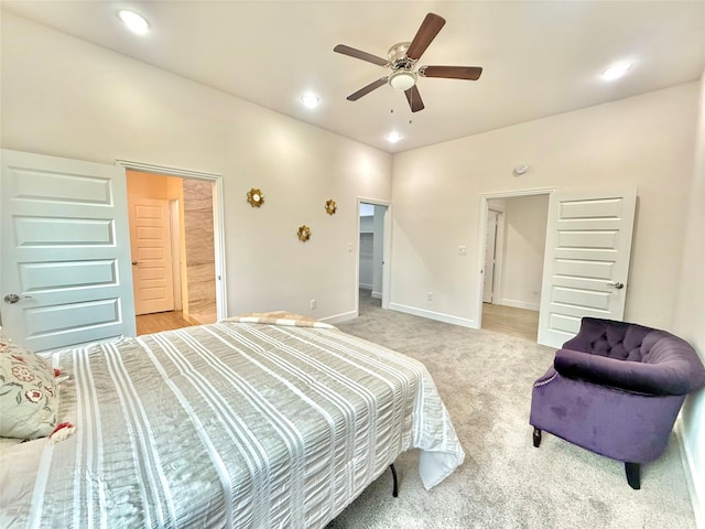 bedroom with light colored carpet and ceiling fan