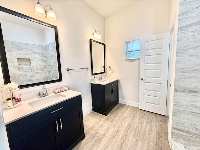 bathroom featuring vanity and hardwood / wood-style floors