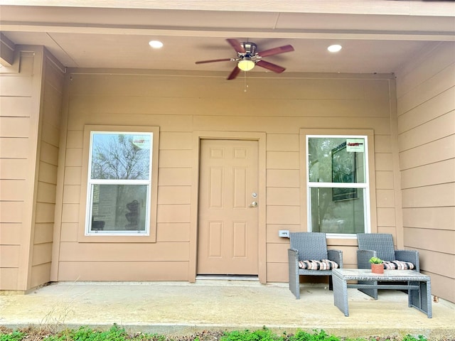 doorway to property featuring an outdoor hangout area and ceiling fan