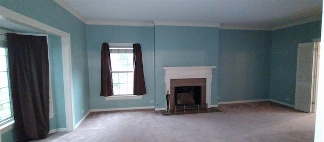 unfurnished living room featuring crown molding and carpet