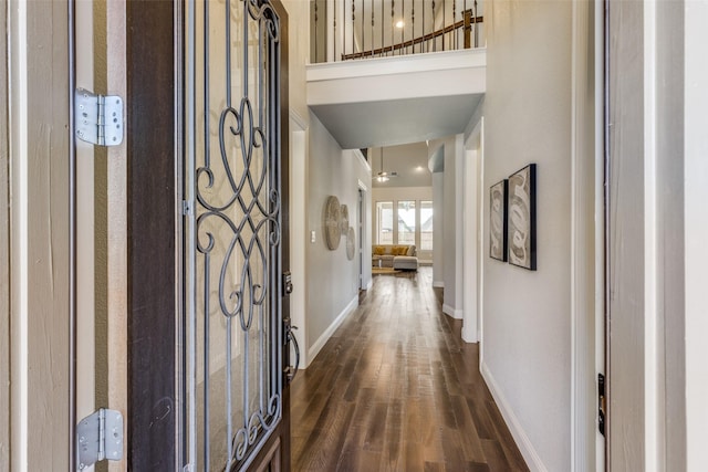 entrance foyer with dark hardwood / wood-style floors