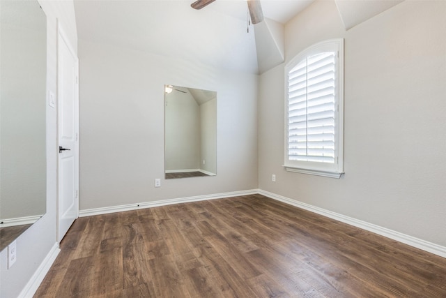 empty room featuring dark hardwood / wood-style floors and ceiling fan