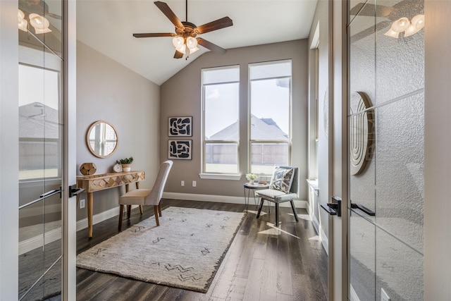 office space with ceiling fan, dark hardwood / wood-style flooring, and vaulted ceiling