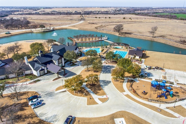 drone / aerial view featuring a water view