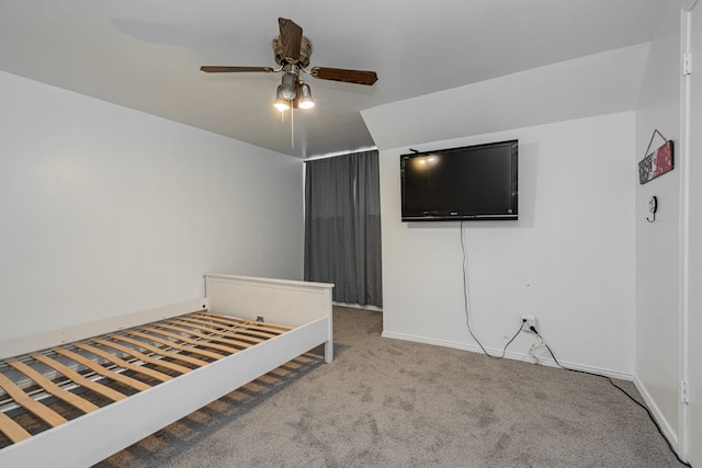 unfurnished bedroom with light carpet and ceiling fan