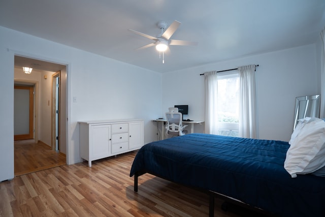 bedroom featuring ceiling fan and light wood-type flooring