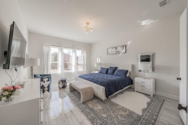 bedroom featuring light hardwood / wood-style floors