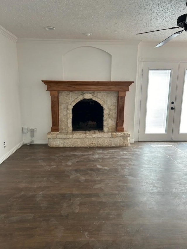 unfurnished living room with ceiling fan, crown molding, french doors, and a textured ceiling