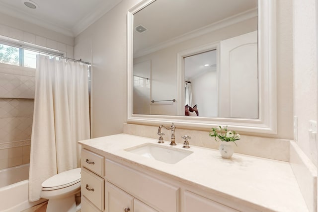 full bathroom featuring crown molding, toilet, vanity, and shower / bath combo with shower curtain