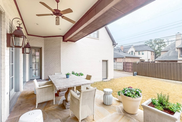 view of patio with ceiling fan