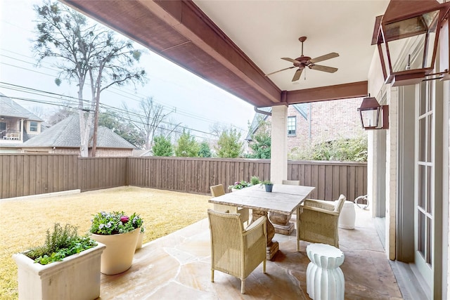 view of patio / terrace featuring ceiling fan