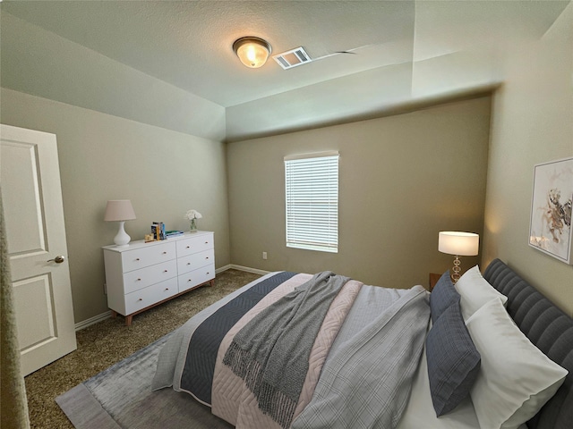 carpeted bedroom featuring vaulted ceiling