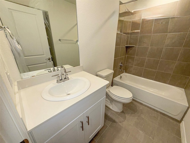 full bathroom with vanity, toilet, and tiled shower / bath