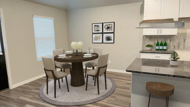 dining space featuring dark hardwood / wood-style flooring and a wealth of natural light